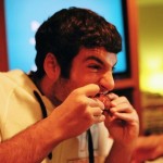 man eating tough meat